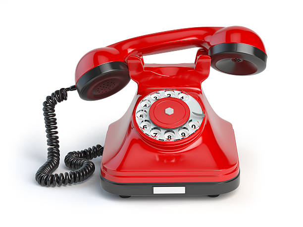 istock Vintage red telephone isolated on white background. Retro styled 523184286