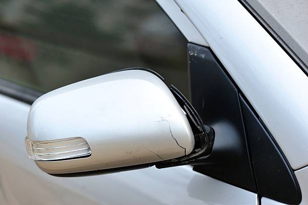 istock damaged car rear view mirror after accident 523185429