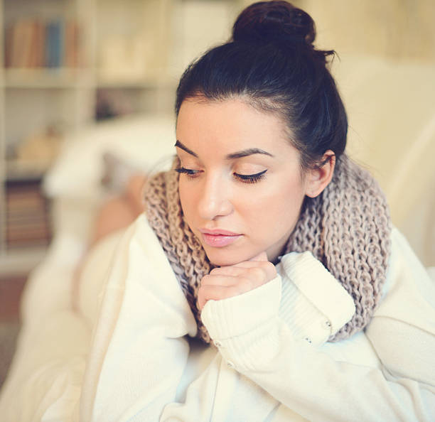 istock young brunette woman in home interior. 523186297