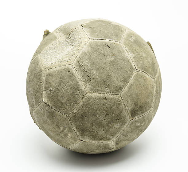 istock old football or soccer on white background isolated 523199431