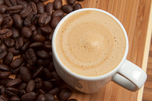 istock Cappuccino with spilled out coffee beans 523200443