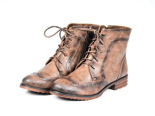 istock Women's Brown Lace-Up Round Toe Combat Boots. Side View 523200597
