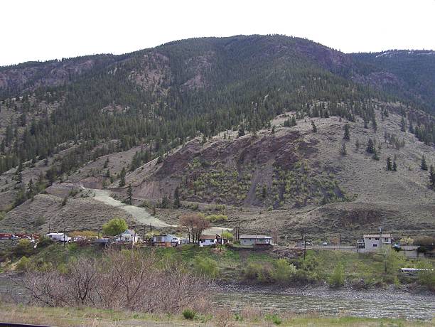 istock Homes under the hills and by river 523212217
