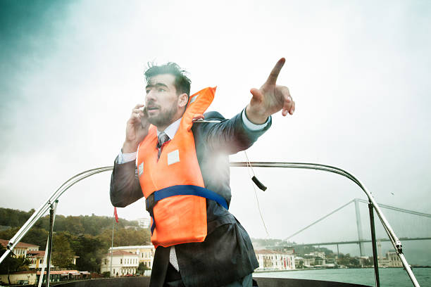 Businessman manages crisis in storm concept