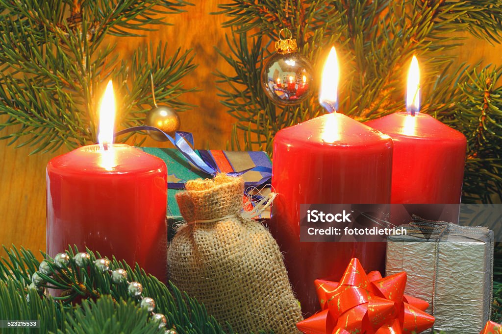 Advent candles Advent candles with fir green gift package and Christmas decoration Advent Stock Photo