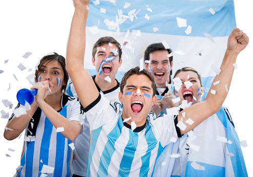 Argentinean soccer fans looking very excited celebrating