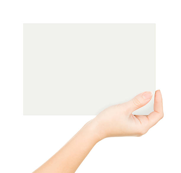 istock Hand holding paper isolated on white 523218613