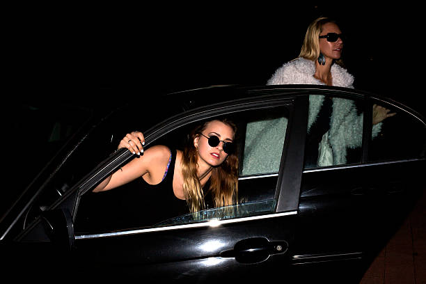 istock two women getting out of a car 523218625