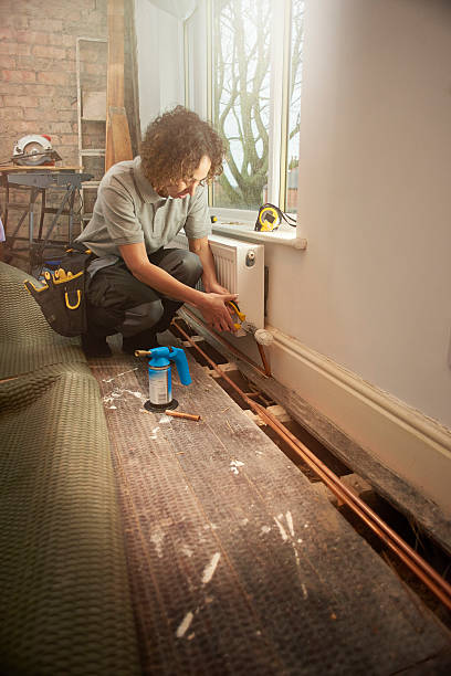 istock female plumber in home renovation 523237040