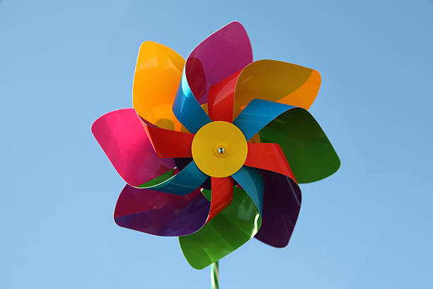 istock Toy pinwheel with blue sky background 523237450