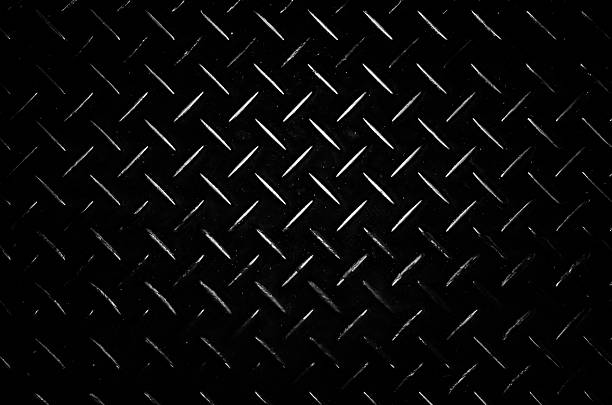 istock Black diamond steel plate dark tone background 523237936