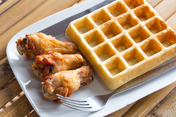 istock fresh waffle with fried chicken on plate 523240060