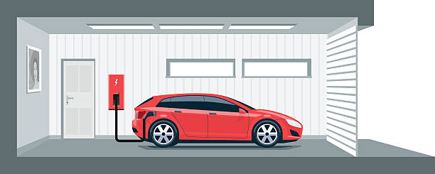 Electric Car Charging at Home in Garage Flat vector illustration of a red electric car charging at the charger station point inside home garage. Integrated smart domestic electromobility e-motion concept. ev charging stock illustrations