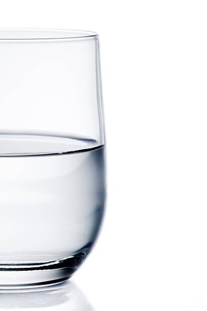 istock half glass of pure water with space for text 523241602