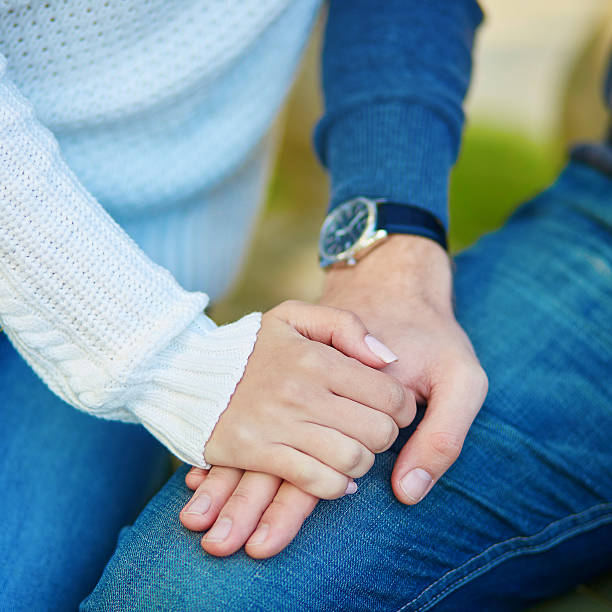 istock Couple holding each others hands 523244368