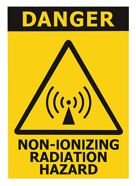 Non-ionizing radiation hazard safety area, danger warning text sign sticker label, large icon signage, isolated black triangle over yellow, macro closeup