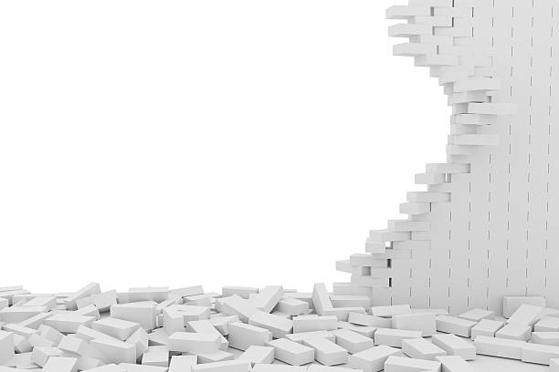 istock Destruction of a white brick wall on white background 523246816