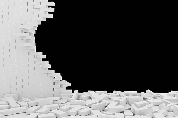 istock Destruction of a white brick wall on black background 523246964