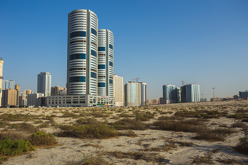 SHARJAH, UAE - NOVEMBER 01, 2013: General view of modern buildings in Sharjah. It is the most industrialized emirate in UAE.