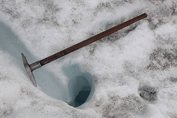 Ice formations and pick axe on glacier in New Zealand 