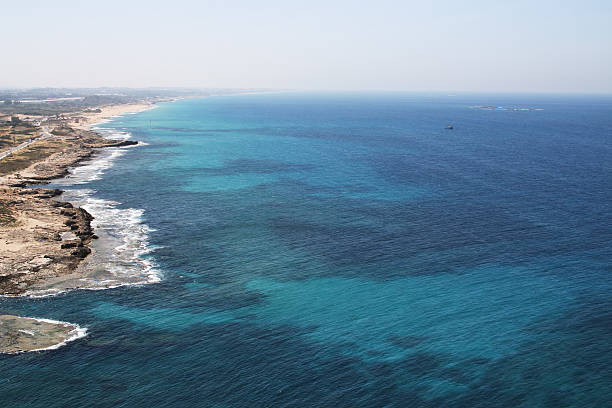 Beautiful view of blue water of Mediterranean sea against backdrop of mountains. Greece.
