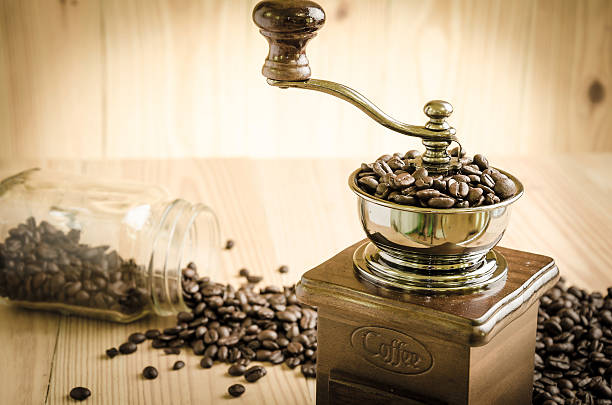 istock Vintage manual coffee grinder with coffee beans 523257218