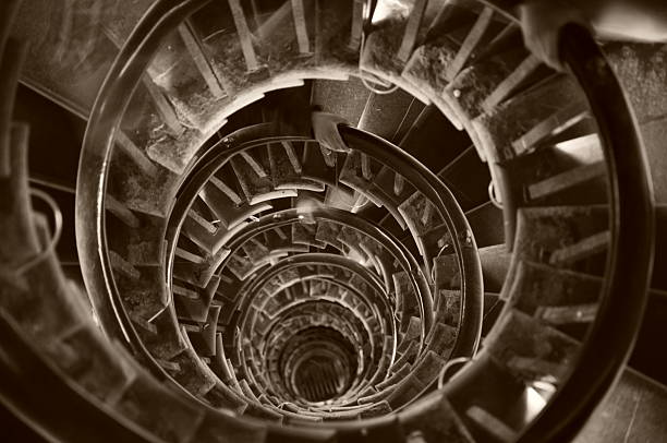 istock Old spiral staircase, Monument, London 523258512