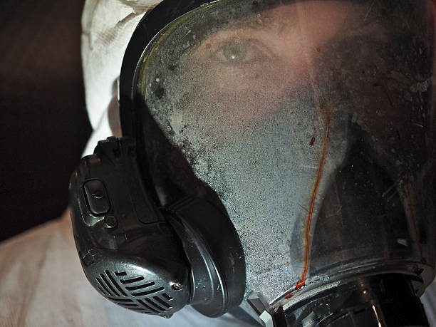 istock Medical Worker Wearing Protective Suit 523258861