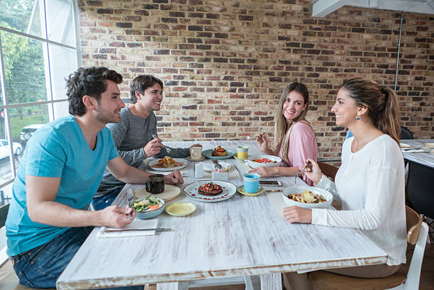 istock Friends eating together at a restaurant 523260306