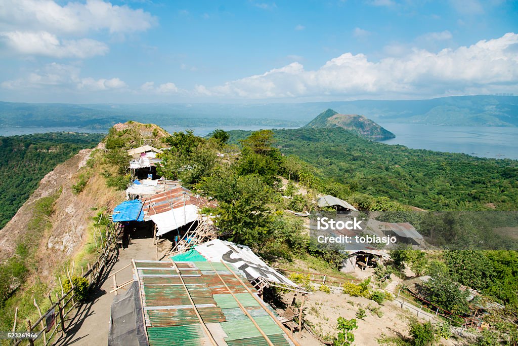 Taal Volcano Island Philippines Taal Volcano Island Philippines close to the city of Tagaytay with some small typical houses. Animal Wildlife Stock Photo