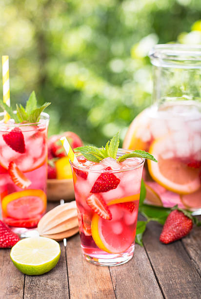 istock Pink lemonade with lemon, lime and strawberries 523262102