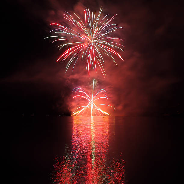 istock Colorful fireworks with reflection on lake. 523262243