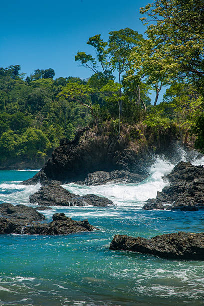 Waves breakign on the Pacific Coast in Costa Rica at Manuel Antonio National Park