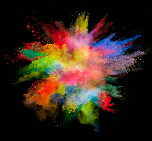 istock Explosion of colored powder on black background 523264712