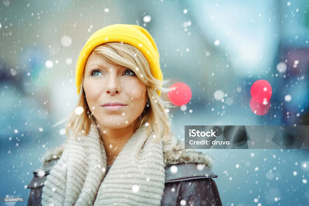 Winter in city Portrait of young woman in the snow 20-24 Years Stock Photo