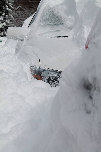 istock car is buried under the snow 523264983