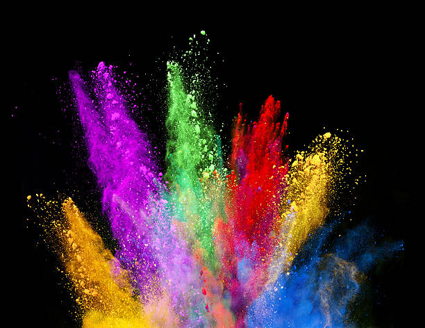 istock Explosion of colored powder on black background 523265008