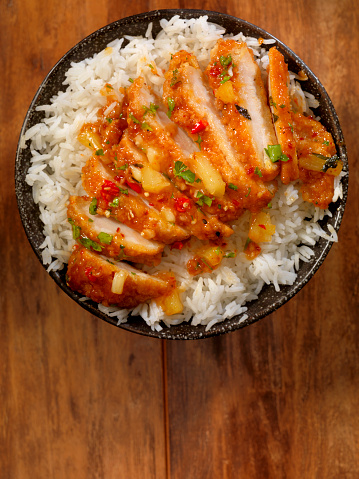 Sweet and Sour Chicken with Pineapple, Chilli Peppers and Parsley -Photographed on Hasselblad H3D2-39mb Camera