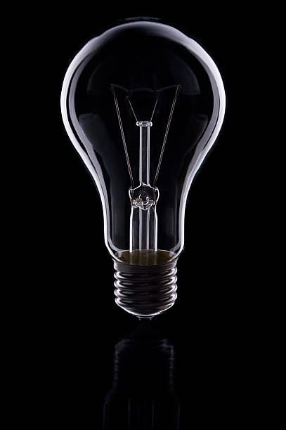 istock electric lamp on black background 523267234
