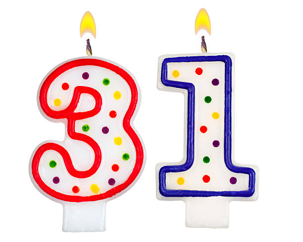 istock Birthday candles number thirty one  isolated on white background 523272159