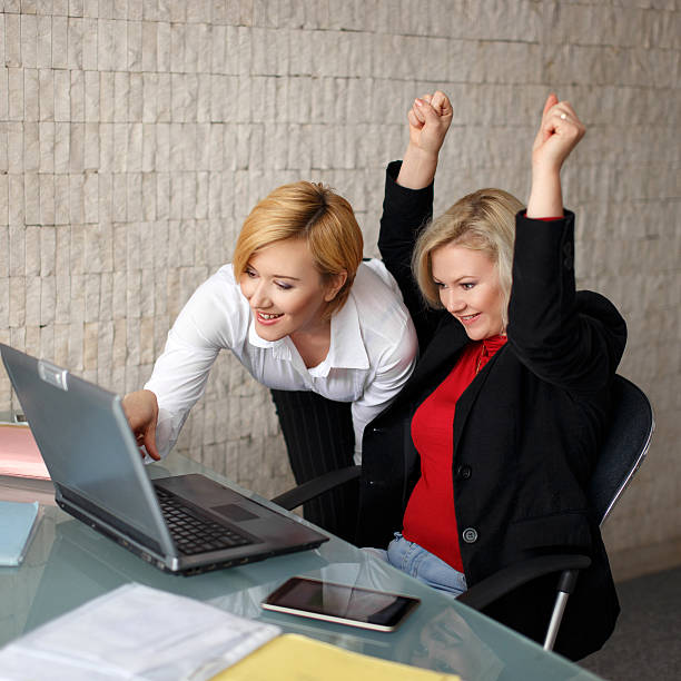 istock Successful managers in office with laptop 523272893
