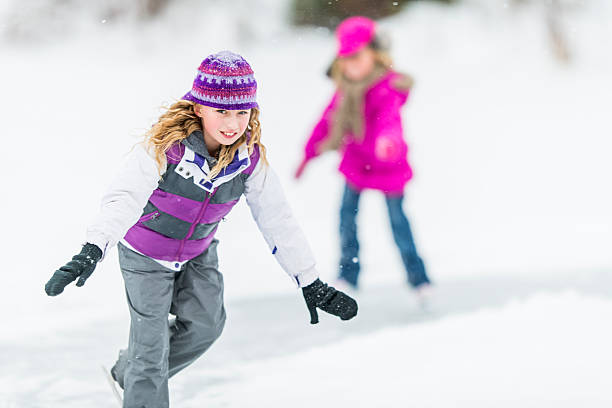 istock Little Girls Ice-skating 523276101