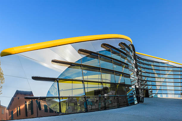 Modena, Italy - September 23, 2013: MEF - Museo Casa Enzo Ferrari is a museum dedicated to Enzo Ferrari, the founder of the famous car marque, native of Modena. The museum consists of two buildings, one is his old house of birth, the other displays car models and news relating to the life and work of Enzo Ferrari. 
