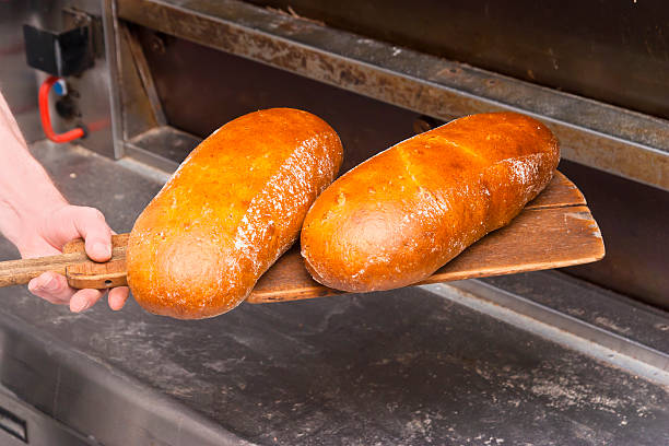 신선한 구은 식빵 on peel - soda bread bread brown bread loaf of bread 뉴스 사진 이미지