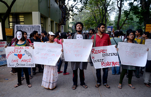 Kolkata,W.B., India- November 05, 2014: Jadavpur University Student standing with poster at \