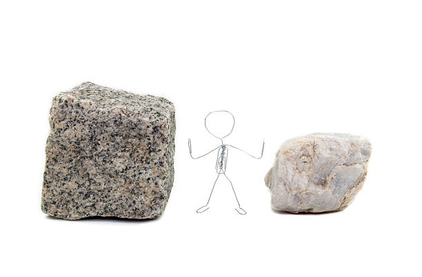 Between a rock and a hard place stock photo