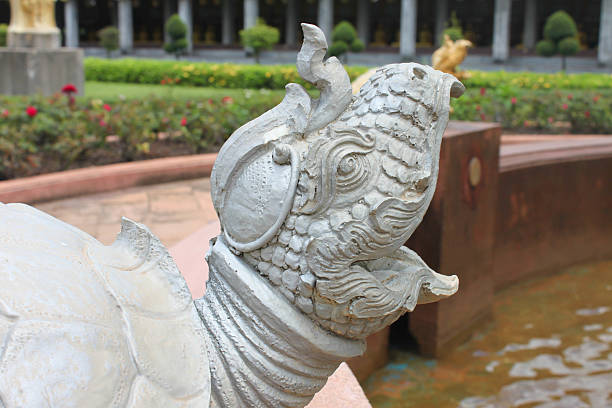 istock Headed box turtle carved open mouth A sculpture art, Thailand 523288701