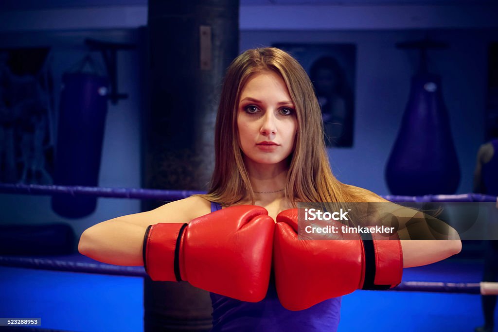 Boxer girl Boxer girl in red boxing gloves Activity Stock Photo