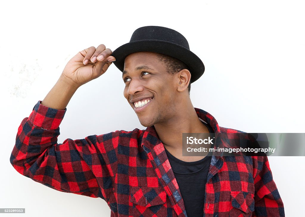 Trendy african man smiling with hat Close up portrait of a trendy african man smiling with hat 20-24 Years Stock Photo