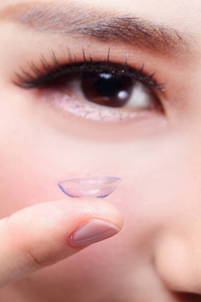 istock human eye and contact lens 523291547